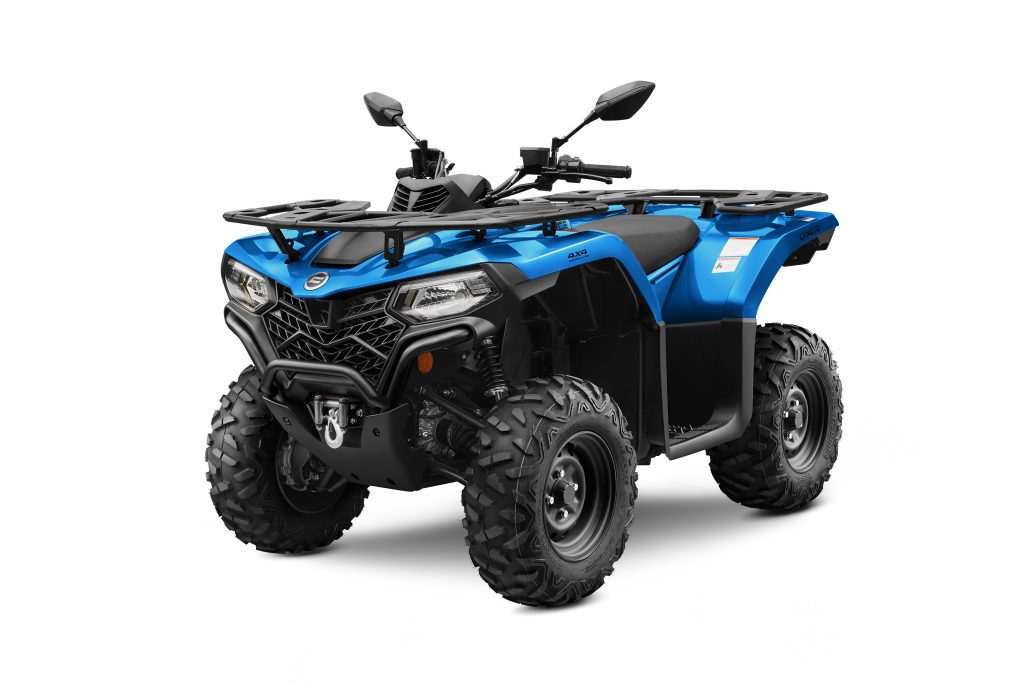 Quad bike in blue an black angled to see the front lights and grill with towing pulley.
